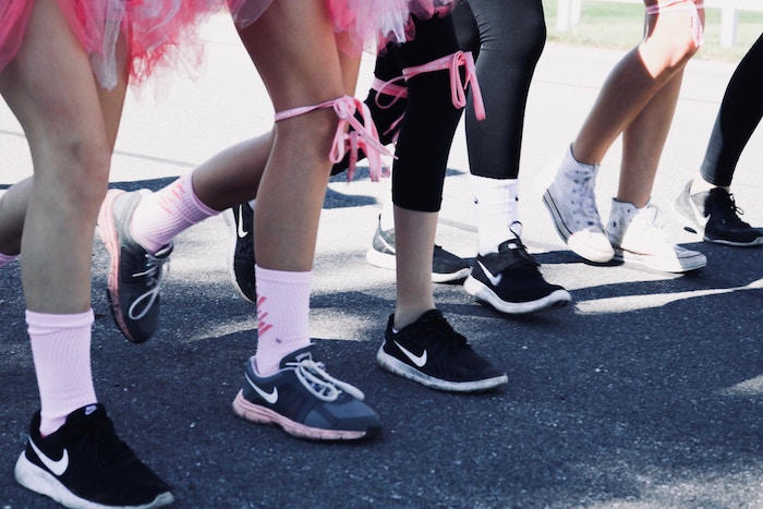 breast cancer awareness month | south coast medical group | race runners starting line